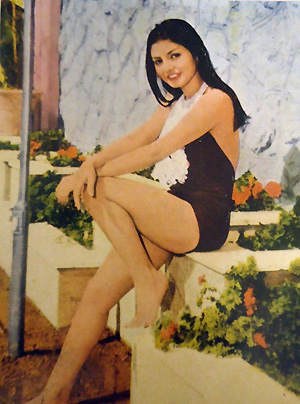 Googoosh in a one-piece swimsuit