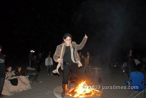 Woman jumping over fire - LA (March 17, 2009) - by QH