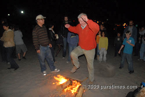 Huell Howser jumping over fire - LA (March 17, 2009) - by QH