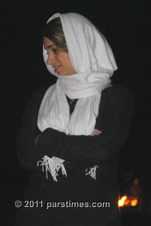 Woman enjoying the fire festival (March 15, 2011) - by QH
