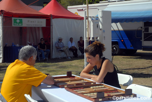 playing backgammon (September 9, 2006) - by QH