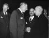 Prime Minister Mohammad Mossadegh being greeted by Dean Acheson.