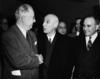 Prime Minister Mohammad Mossadegh of Iran being greeted by Henry F. Grady.