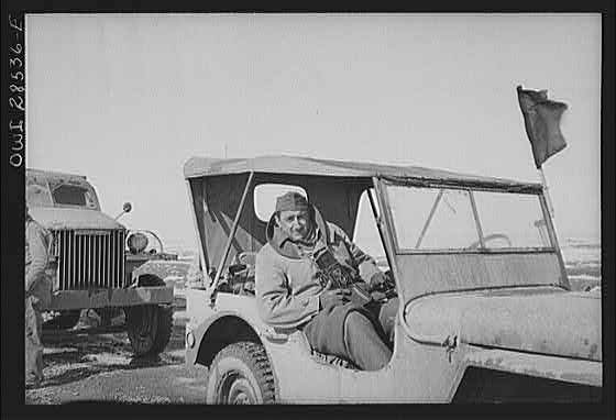 OWI (Office of War Information) photographer Nick Parrino somewhere in the Persian corridor in the Jeep in which he rode to make a photographic record of the first run by an all American United States Army convoy carrying supplies for Russia.