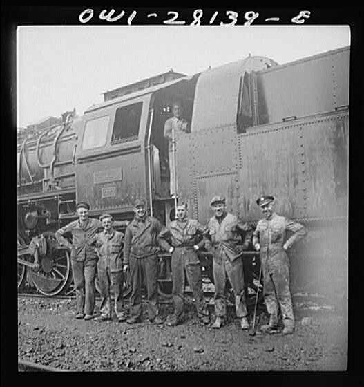 American and British railroad crews who are taking supplies for Russia. Somewhere in Iran.