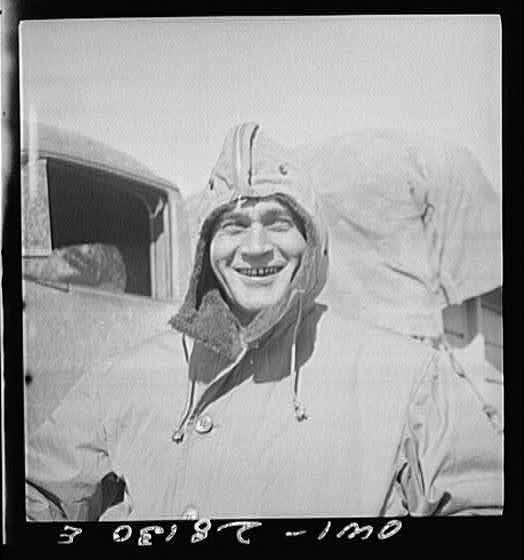 Somewhere in Iran. Jack Tchernawitz, a Russian-born United States Army Major of New York, New York, wearing his parka at a delivery point of American supplies to Russia. Major Tchernawitz is the Russian-speaking liason officer of the United States Army forces here.