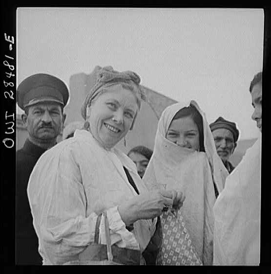 Teheran, Iran. Mrs. Louis Dreyfus, wife of the United States Minister to Iran, visiting native inhabitants