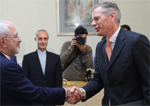 Javad Zarif greets British  Ambassador to Iran Rob Macaire