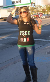Female protestor demanding freedom for Iran