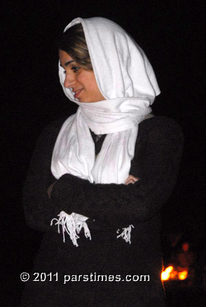 Iranian-American woman wearing a long headscarf
