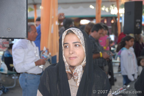 A young Muslim woman wearing a scarf