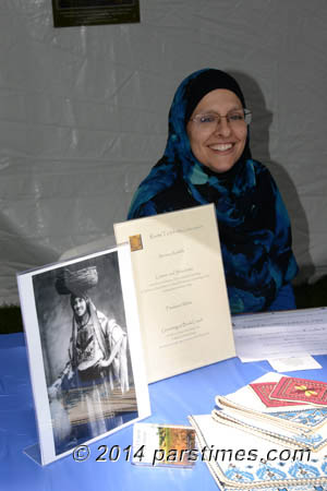 A young American muslim woman wearing a full hijab (her neck isn't visible)