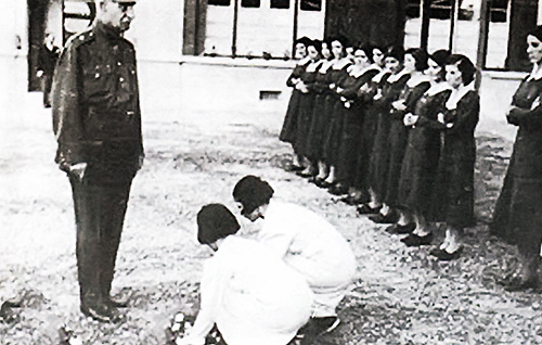 Reza Shah visiting a school