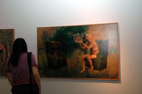 Painter Pauline Argyriou admiring Hossein Khosrojerdi's work - by QH