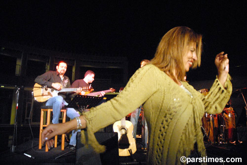 Woman dancing to the music (August 13, 2006) - by QH