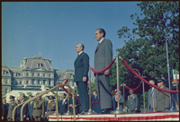 President Nixon and the Shah of Iran on the reviewing stand, on the south lawn of the White House, 10/21/1969 - ARC Identifier: 194300.